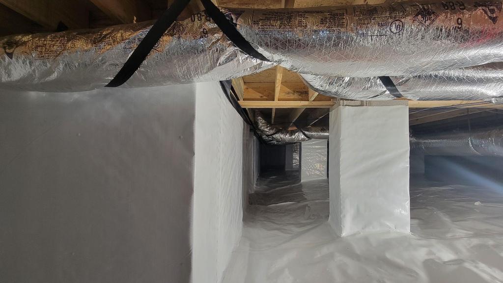 Crawl space encapsulation barrier installation — before